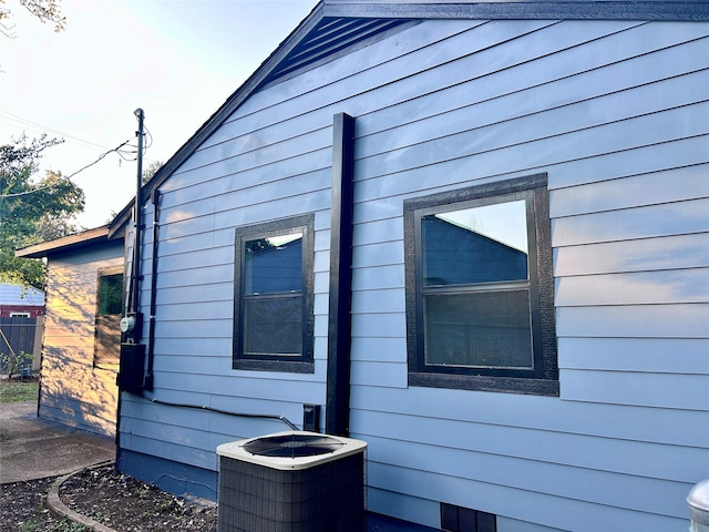 view of property exterior featuring central air condition unit