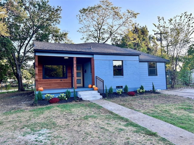 view of front of home featuring covered porch