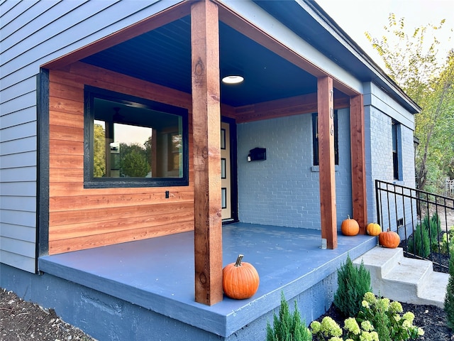 property entrance with a porch