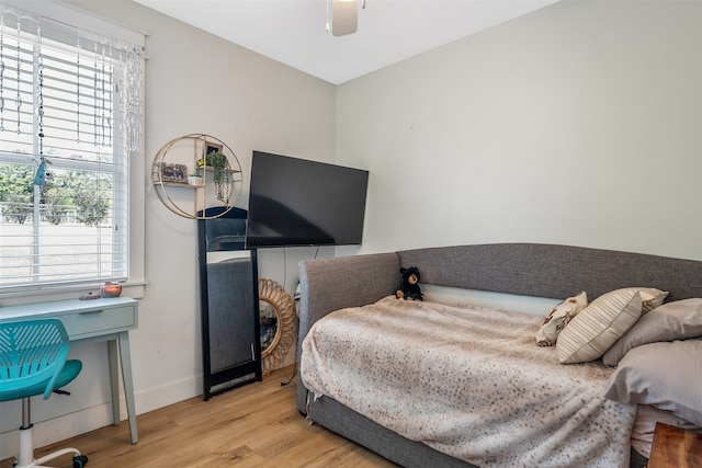 bedroom featuring ceiling fan and light hardwood / wood-style floors