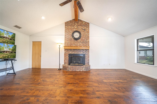 unfurnished living room with hardwood / wood-style floors, visible vents, lofted ceiling with beams, and ceiling fan