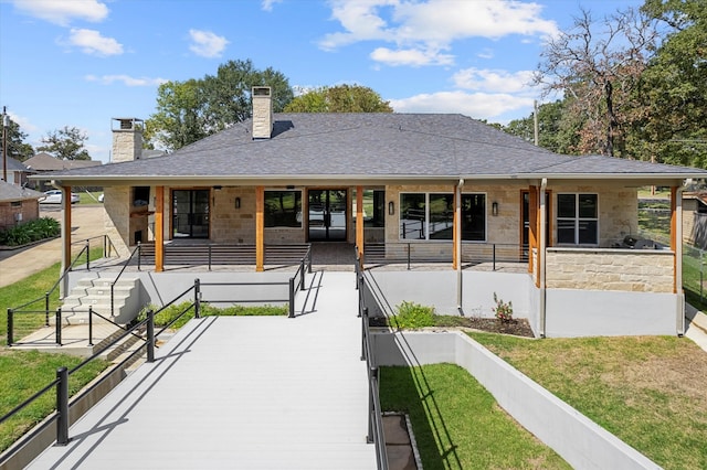 rear view of property with a patio area and a yard