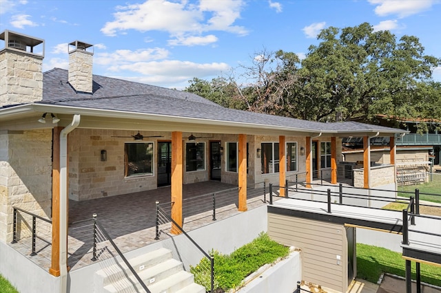 wooden deck with a patio area and ceiling fan