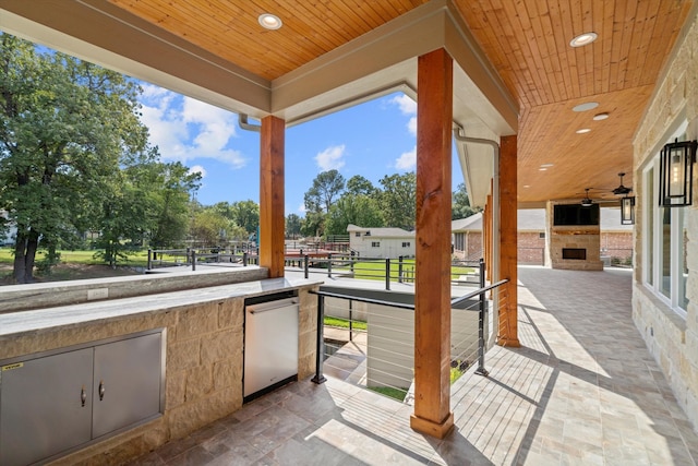 view of patio / terrace with ceiling fan