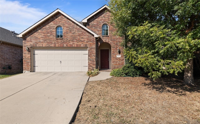 front of property with a garage