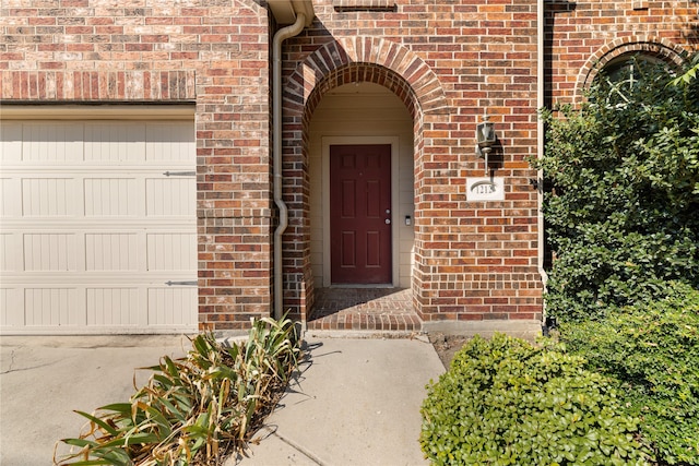 property entrance featuring a garage