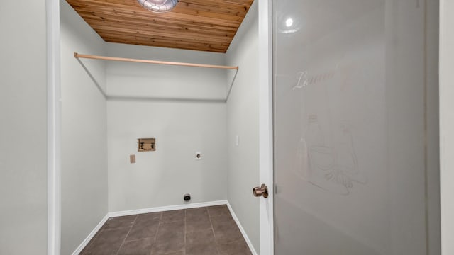 clothes washing area featuring hookup for a washing machine, baseboards, wooden ceiling, and laundry area