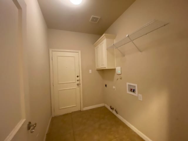 washroom featuring washer hookup, hookup for a gas dryer, cabinets, tile patterned flooring, and electric dryer hookup