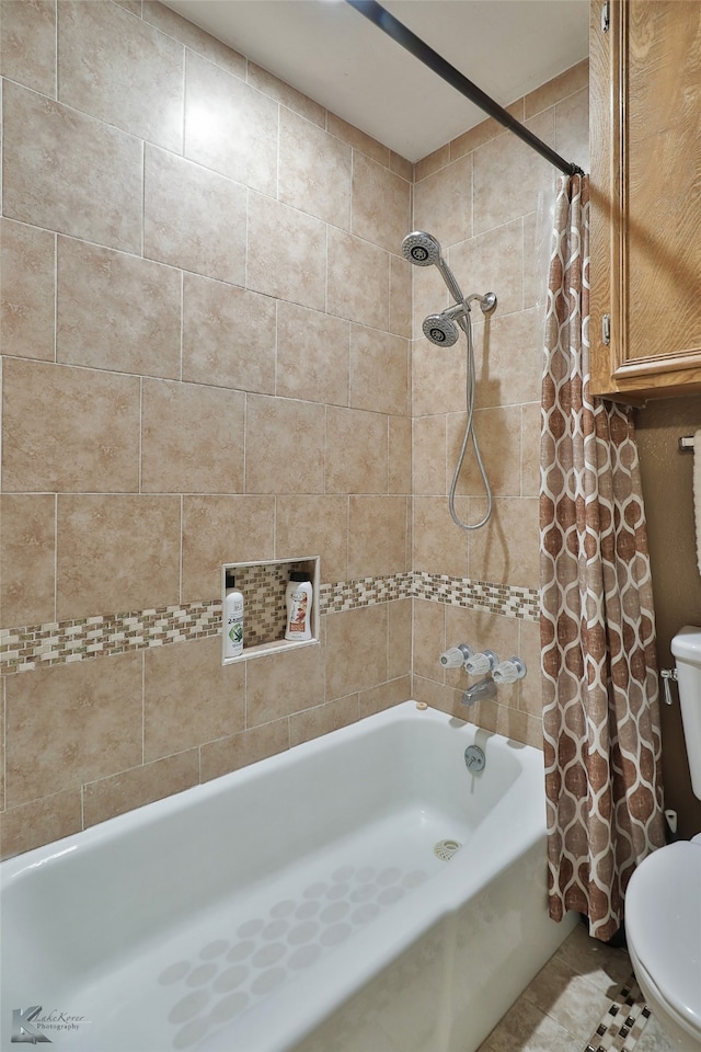 bathroom featuring shower / bath combination with curtain and toilet