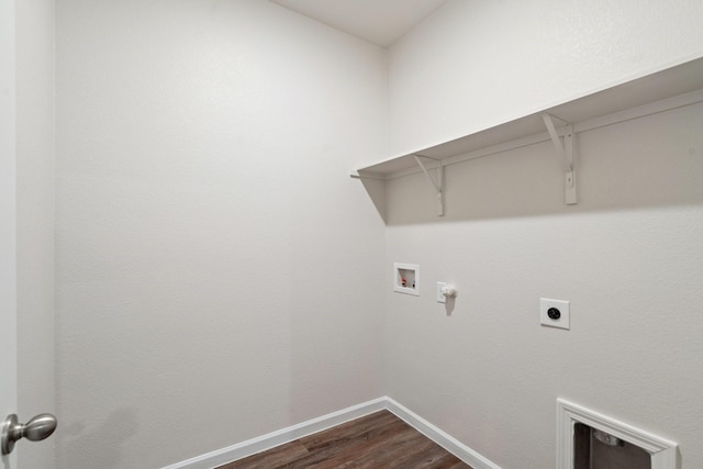 clothes washing area with laundry area, baseboards, hookup for a washing machine, electric dryer hookup, and dark wood finished floors