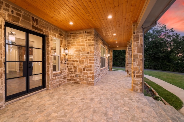 patio terrace at dusk with french doors