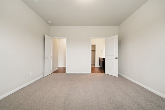 unfurnished bedroom featuring carpet floors