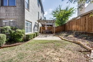 view of yard featuring a patio and a pergola