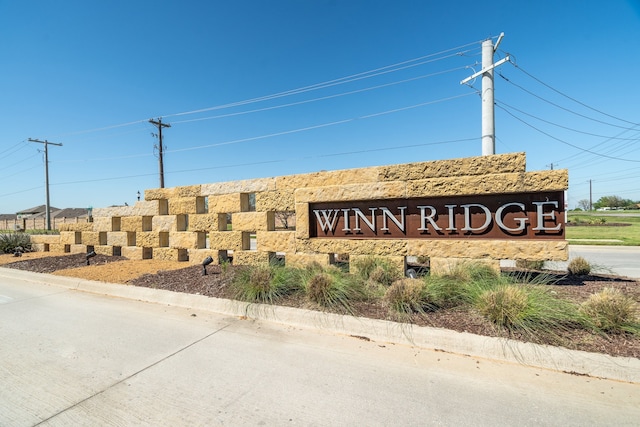 view of community sign