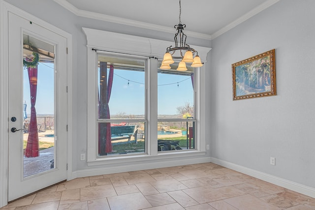 unfurnished dining area with crown molding, a wealth of natural light, and an inviting chandelier