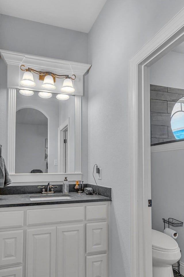 555 Mastadon Way, Weatherford, TX 76085 - bathroom featuring vanity and toilet