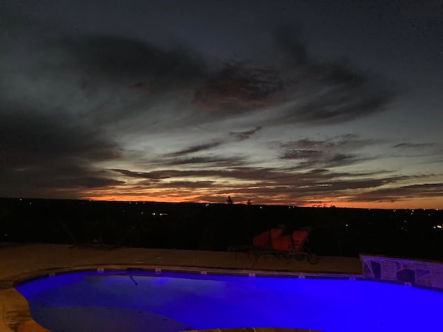 555 Mastadon Way, Weatherford, TX 76085 - view of pool at dusk
