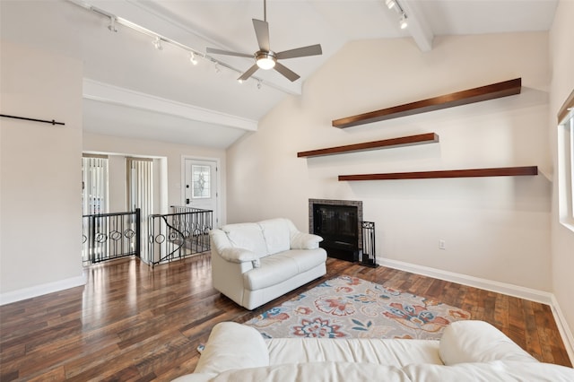 living room featuring track lighting, vaulted ceiling, ceiling fan, and dark wood-type flooring