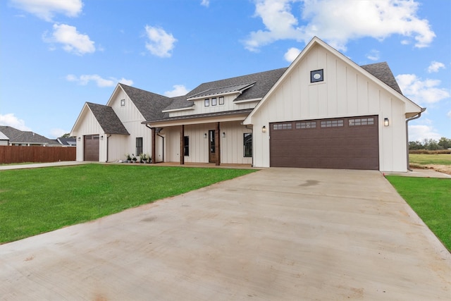 modern farmhouse style home with a garage and a porch