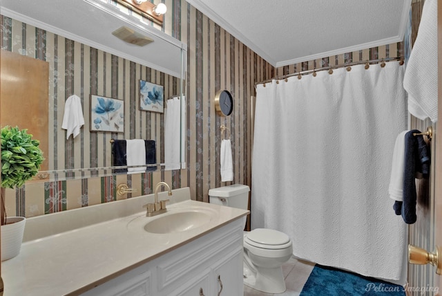 bathroom featuring tile patterned flooring, crown molding, a textured ceiling, toilet, and vanity