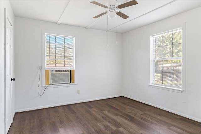 unfurnished room with ceiling fan, cooling unit, and dark hardwood / wood-style floors