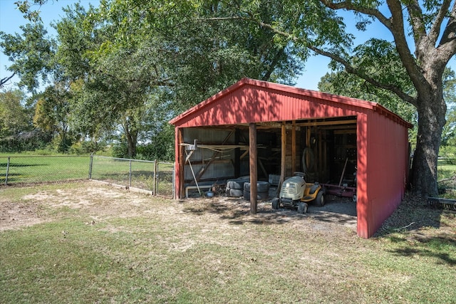 view of outdoor structure with a yard