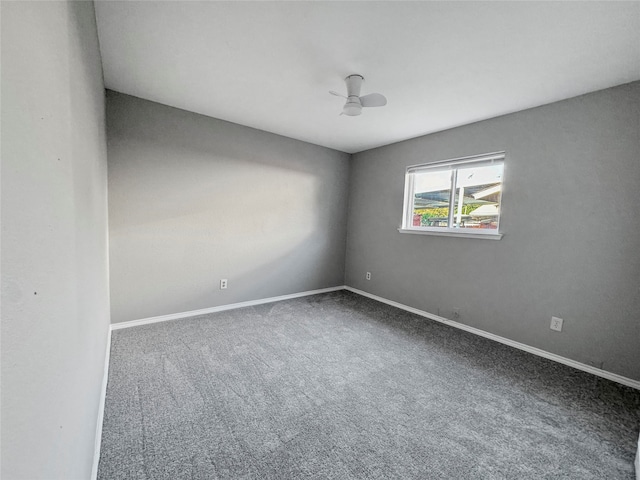 empty room with carpet floors and ceiling fan