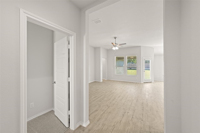 corridor featuring light wood-type flooring