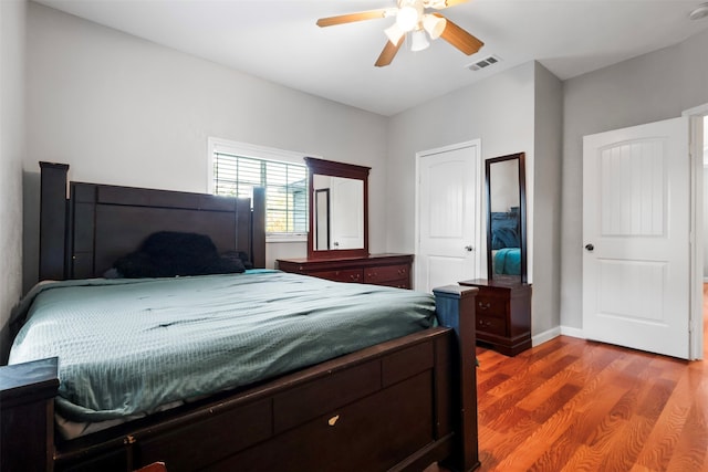 bedroom featuring wood-type flooring and ceiling fan