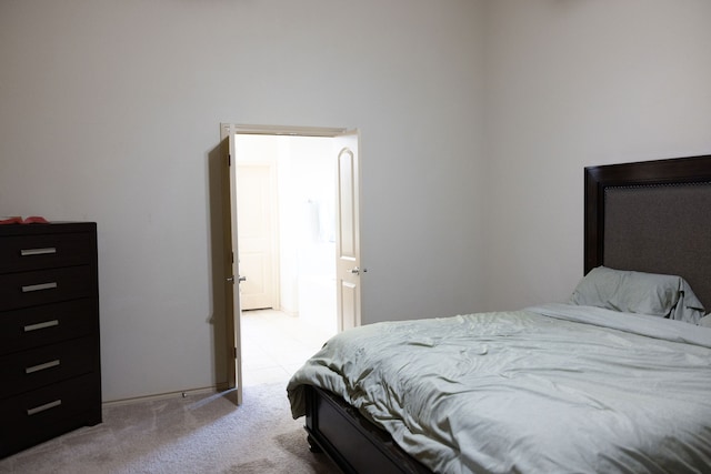 bedroom with light carpet