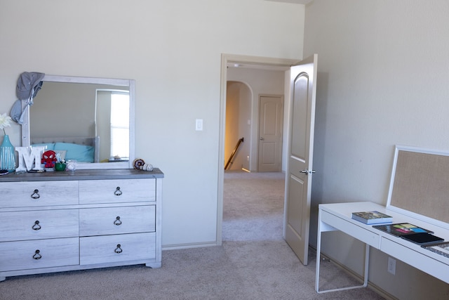 bedroom with light carpet