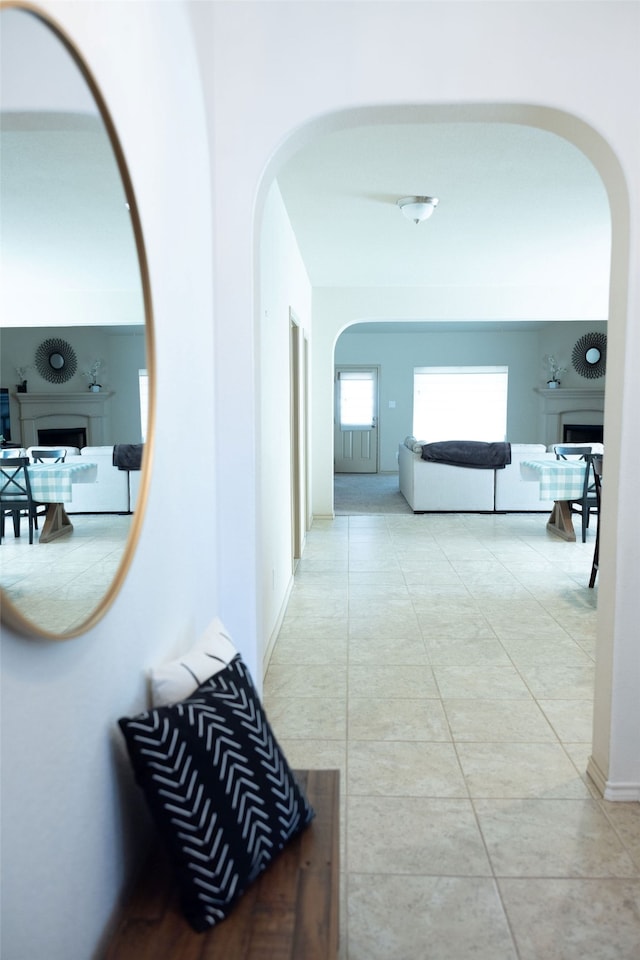 corridor with light tile patterned floors