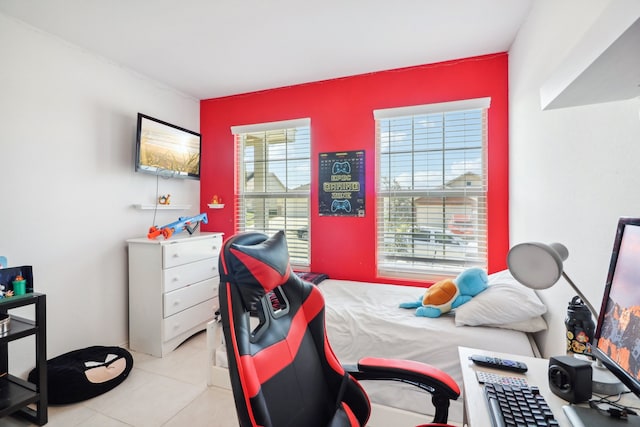 bedroom with light tile patterned flooring