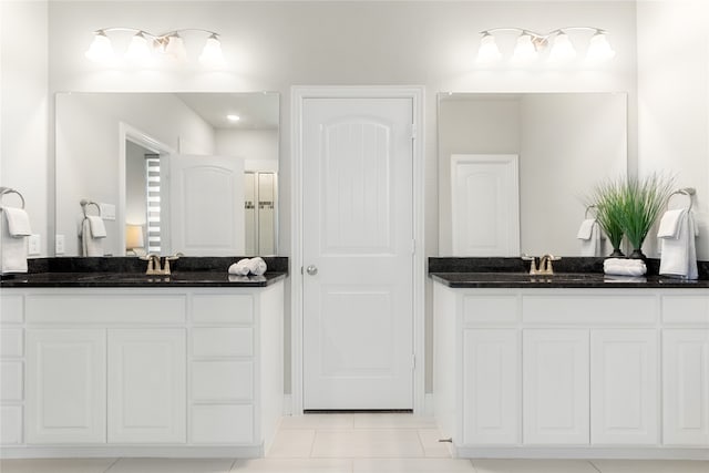 bathroom featuring vanity and tile patterned floors