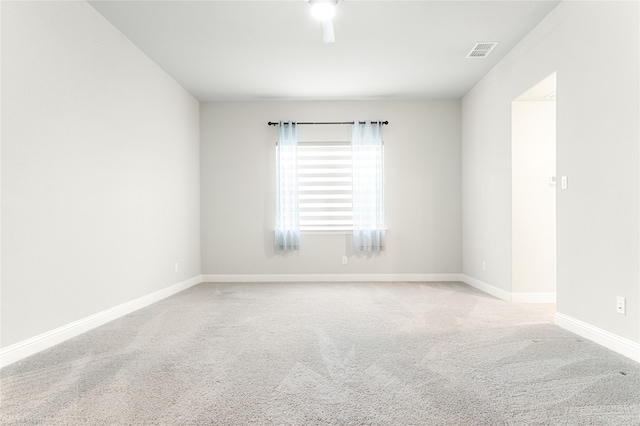 spare room with carpet