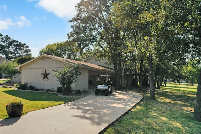 view of side of property featuring a yard