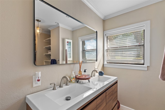 bathroom with ornamental molding and vanity