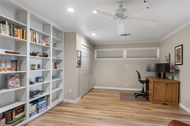 office space with light wood-type flooring, crown molding, and ceiling fan