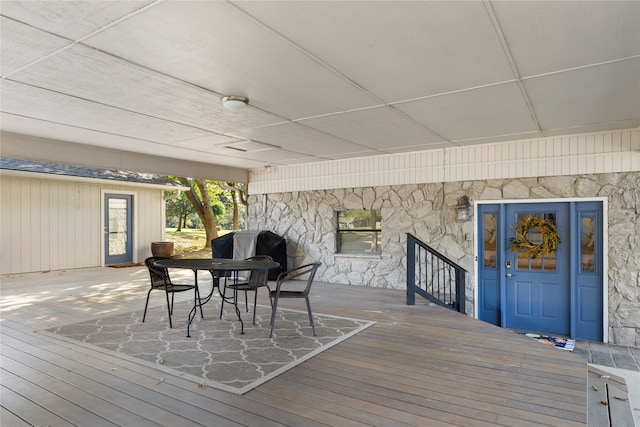 wooden deck featuring grilling area