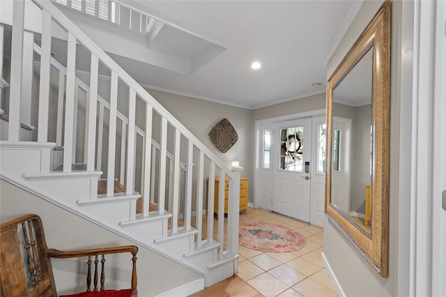 tiled entrance foyer with ornamental molding