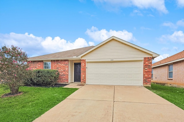 ranch-style house with a front yard and a garage