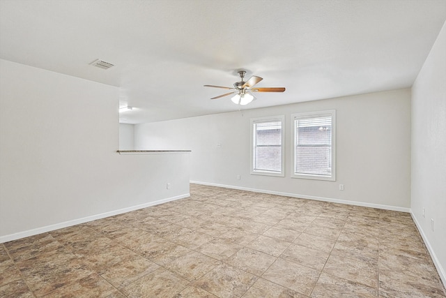 empty room featuring ceiling fan