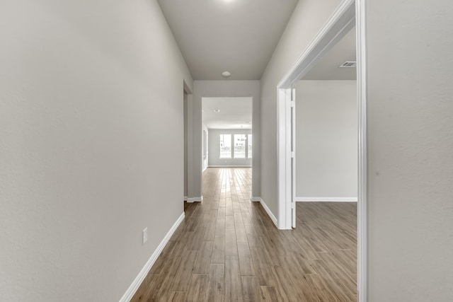 hall featuring light hardwood / wood-style flooring