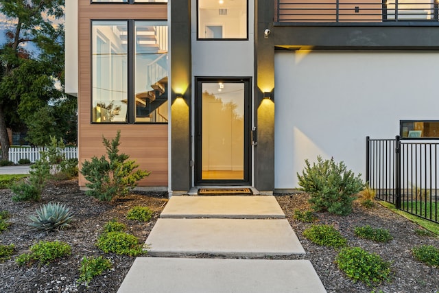 property entrance with a balcony