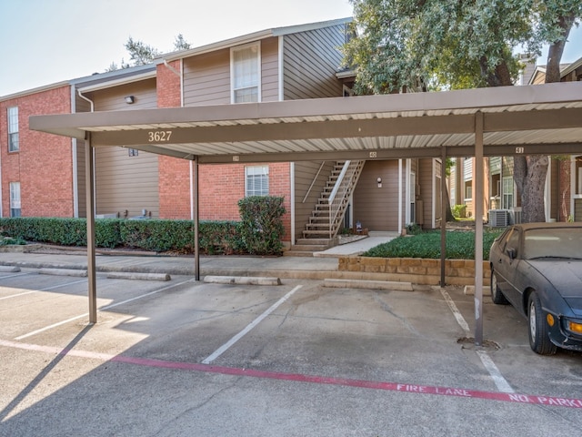 view of car parking with a carport