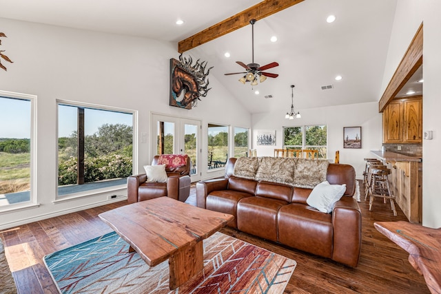 living room with high vaulted ceiling, french doors, dark wood-type flooring, ceiling fan with notable chandelier, and beam ceiling