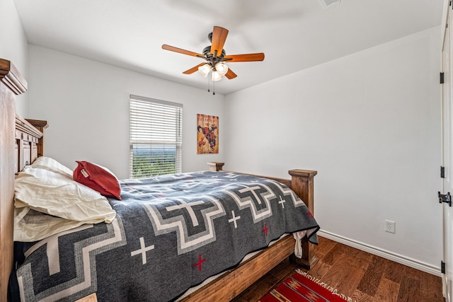 bedroom with ceiling fan and hardwood / wood-style floors