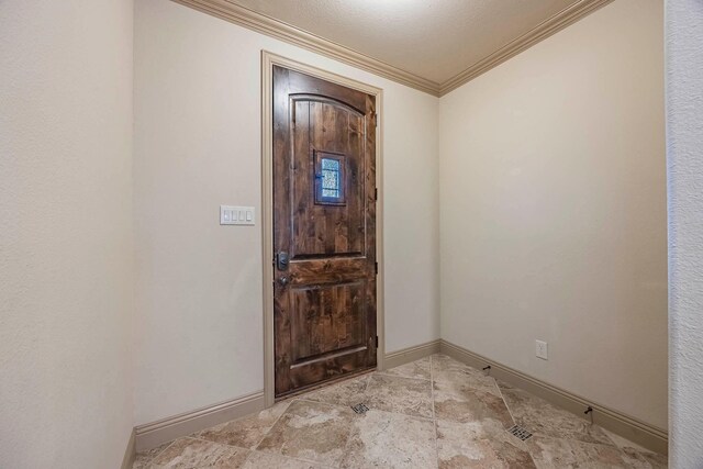 941 Lake Meadow Ln, Little Elm, TX 75068 - entrance foyer featuring baseboards and ornamental molding