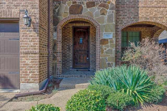 property entrance featuring a garage