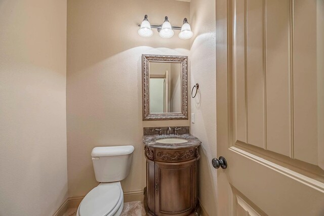 941 Lake Meadow Ln, Little Elm, TX 75068 - bathroom featuring vanity and toilet